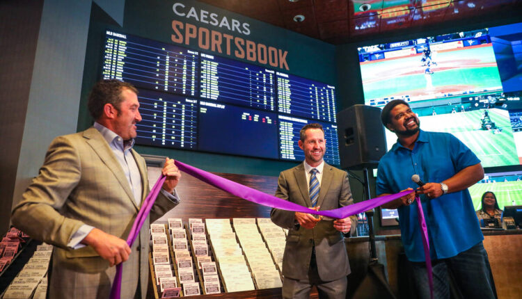 David Grolman, senior vice president of retail operations for Caesars Sportsbook, from left, Da ...