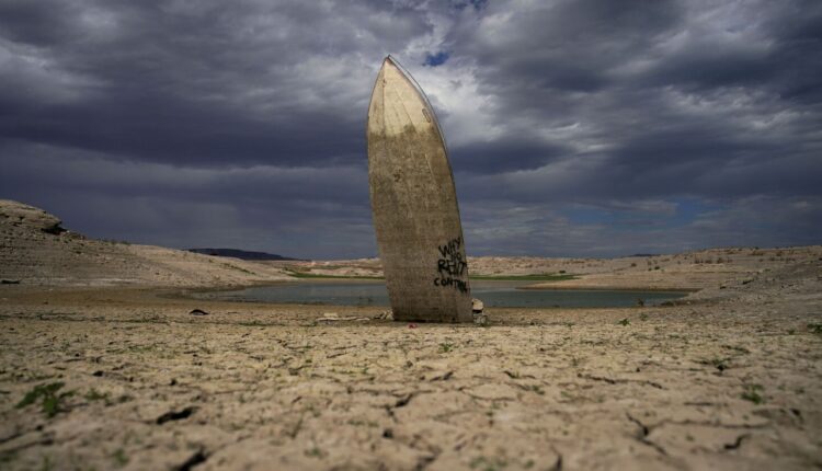 What has the drought revealed in shrinking Lake Mead and Lake Powell?
