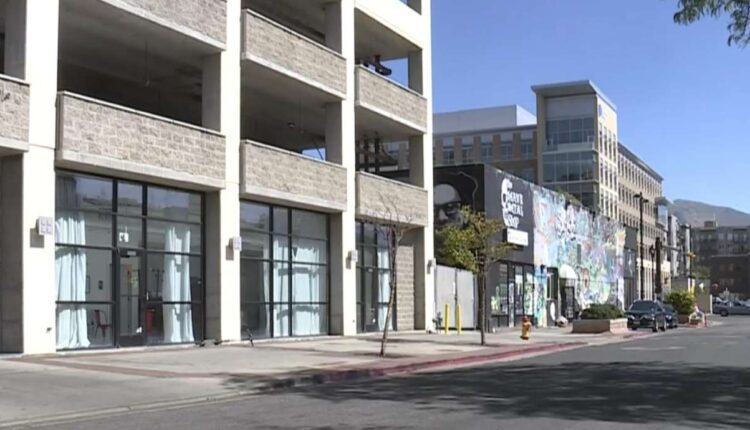 Two men believed to have been part of a group responsible for a shooting death inside the Exchange Place parking structure in downtown Salt Lake City in 2018 have been criminally charged. 