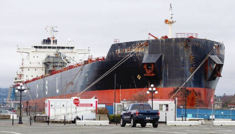 Cargo ship leaves Ogden Point and another takes its place
